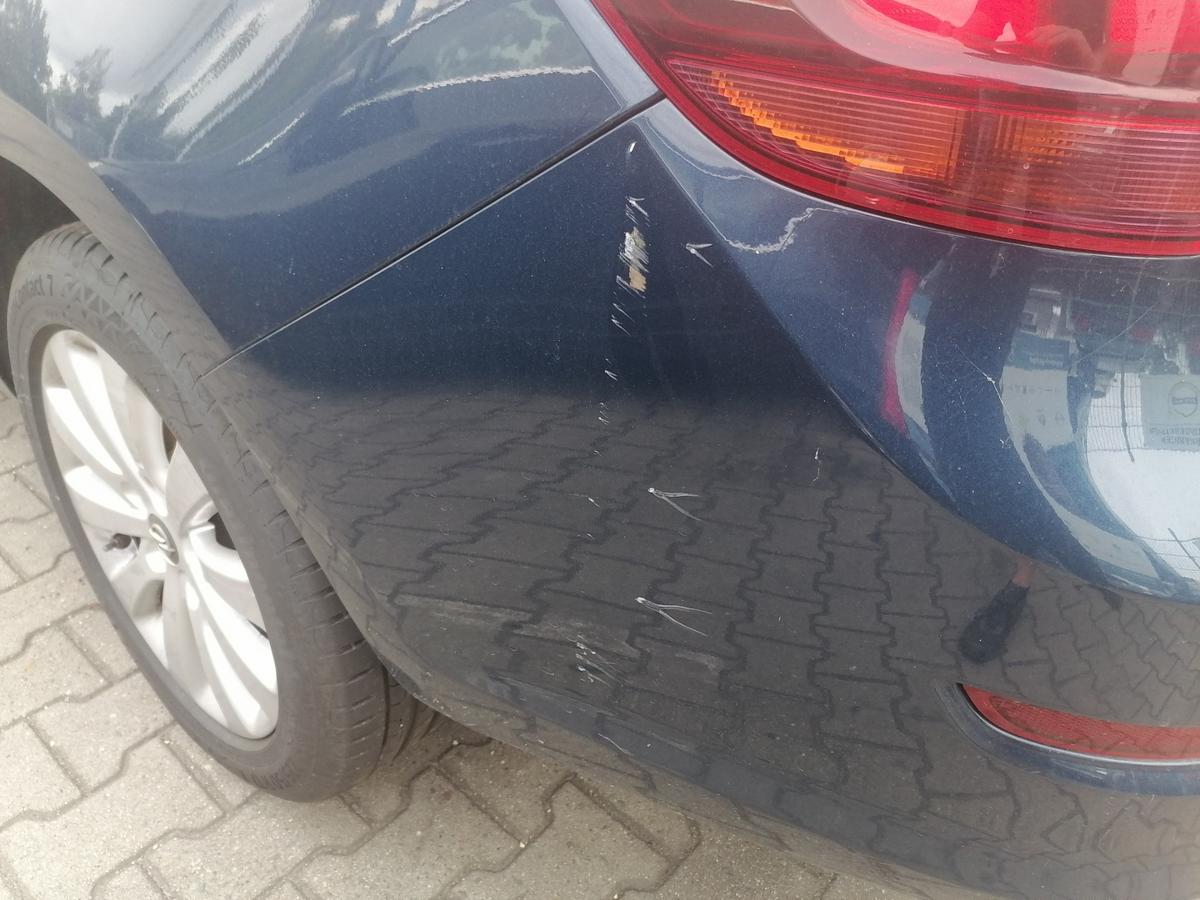 Opel Astra J Sportsturer original Sto&szlig;stange Stossf&auml;nger hinten Z22A Ozeanblau Bj.2011